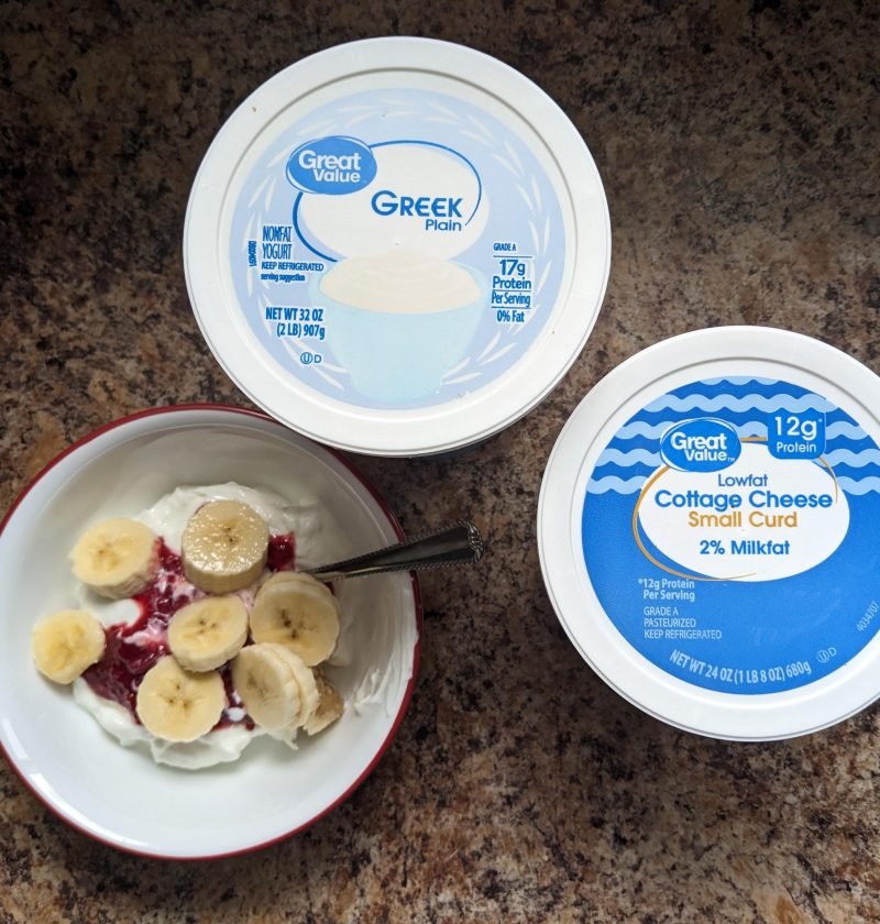 Greek yogurt and cottage cheese side by side with a bowl of Greek yogurt and fruit
